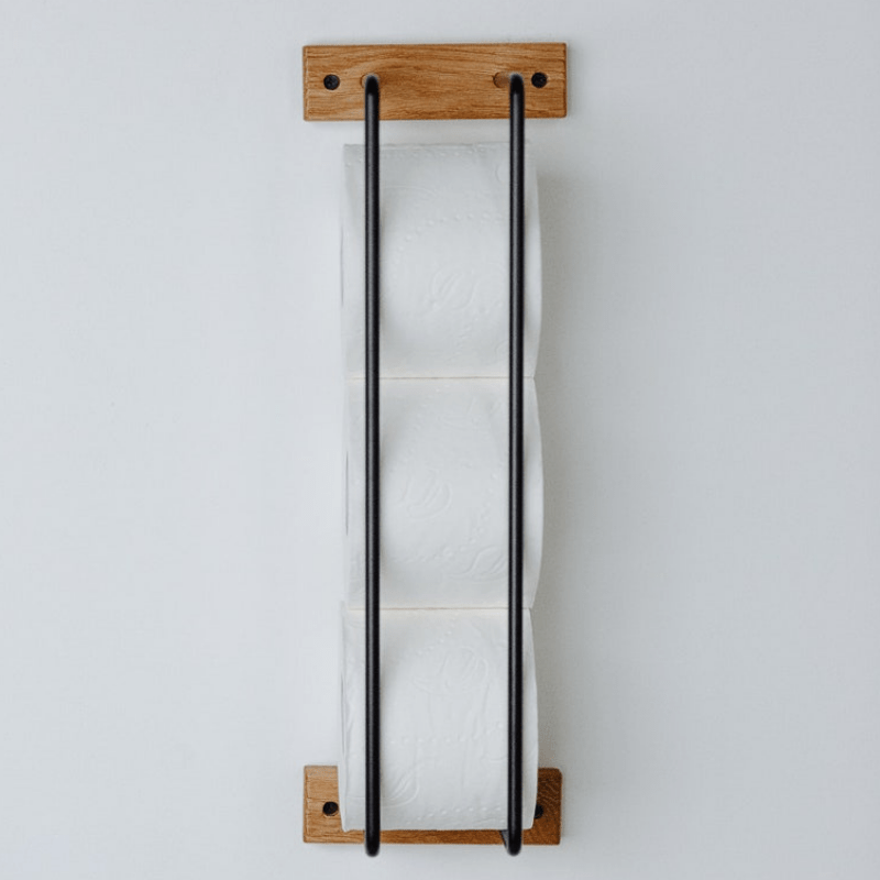 porte papier toilette mural en bois et métal, design élégant, gain de place et pratique pour une salle de bain organisée.