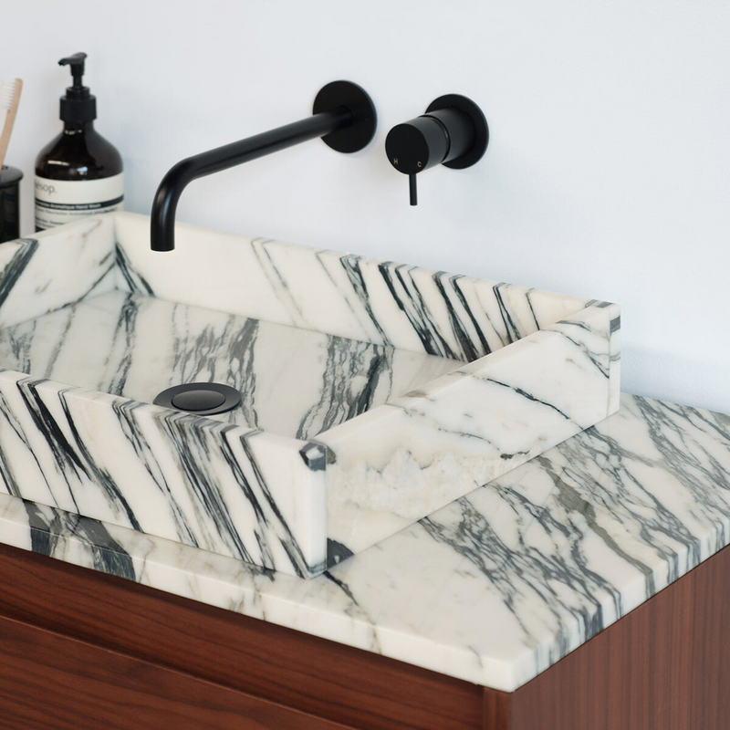 Vasque en pierre naturelle pour décoration salle de bain élégante